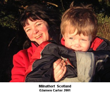 James took this photo of Claire and Frazer at the old church near Loch Levin. Milnathort, Scotland. There are no links to or from this image. &copy;2001 - James Carter