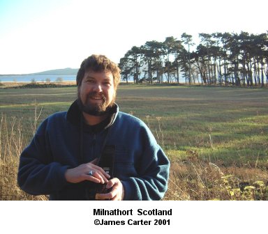 James took this photo of me at the old church near Loch Levin. Milnathort, Scotland. There are no links to or from this image. &copy;2001 - James Carter